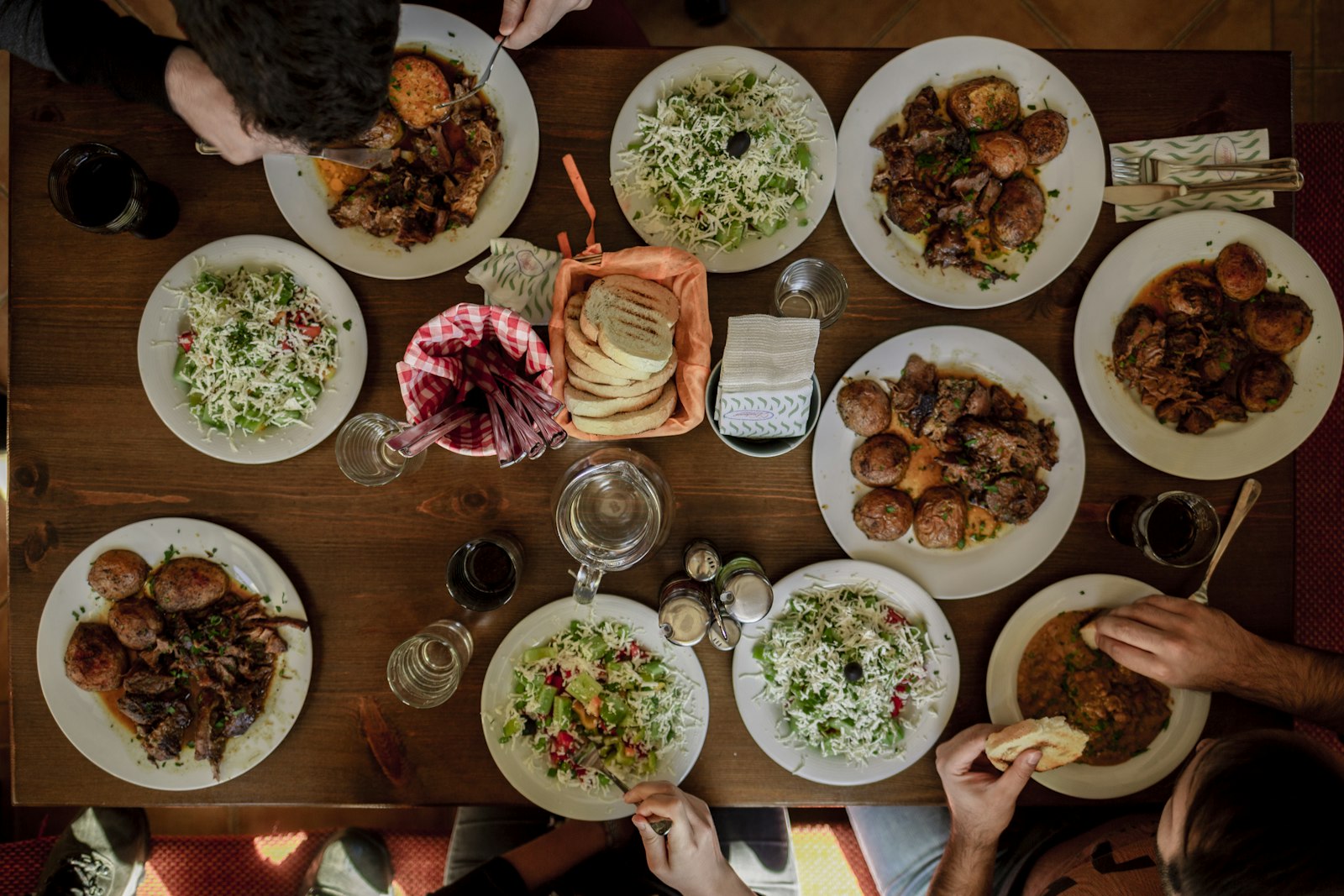 Shared family meal with several dishes on a table